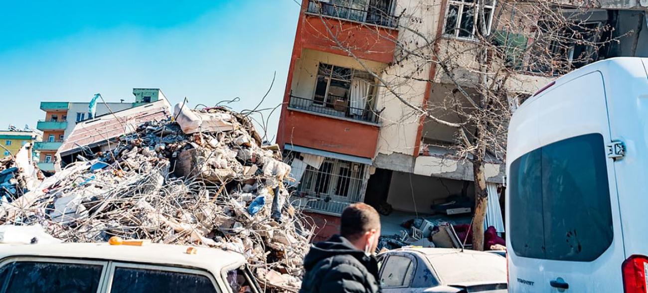 building rubbles and a building which bend down after the earthquake