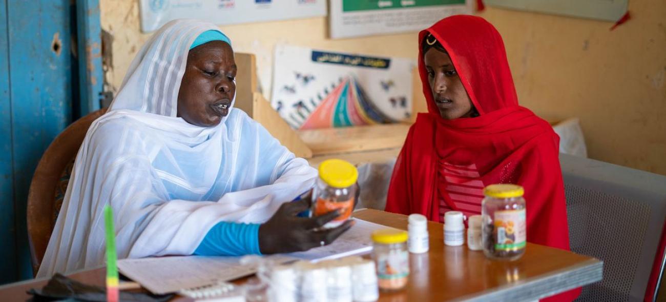 A young pregnant mother is seen for an antenatal checkup at a health centre in Kassala state, Sudan.