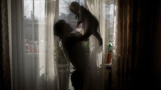 Mother and child at home in Kyrgyzstan