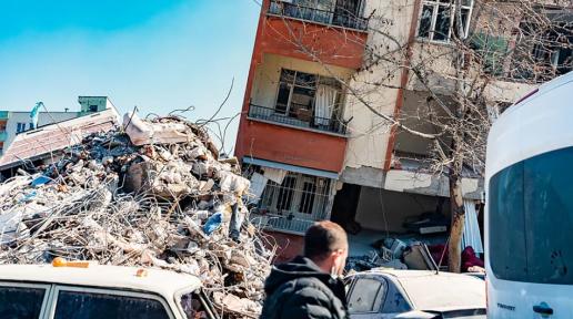 building rubbles and a building which bend down after the earthquake