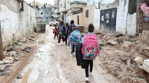 Children walk through partially destroyed streets in Jenin in the West Bank. (file)